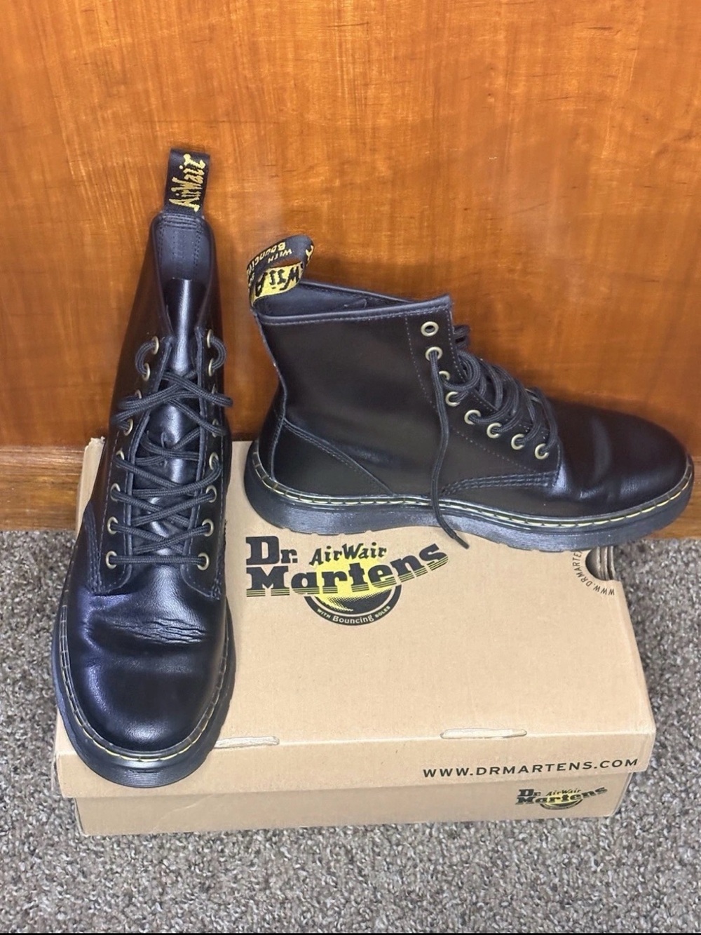 Dr. Martens Black Leather 8-Eye Lace-Up Combat Boots with Yellow Heel Loop